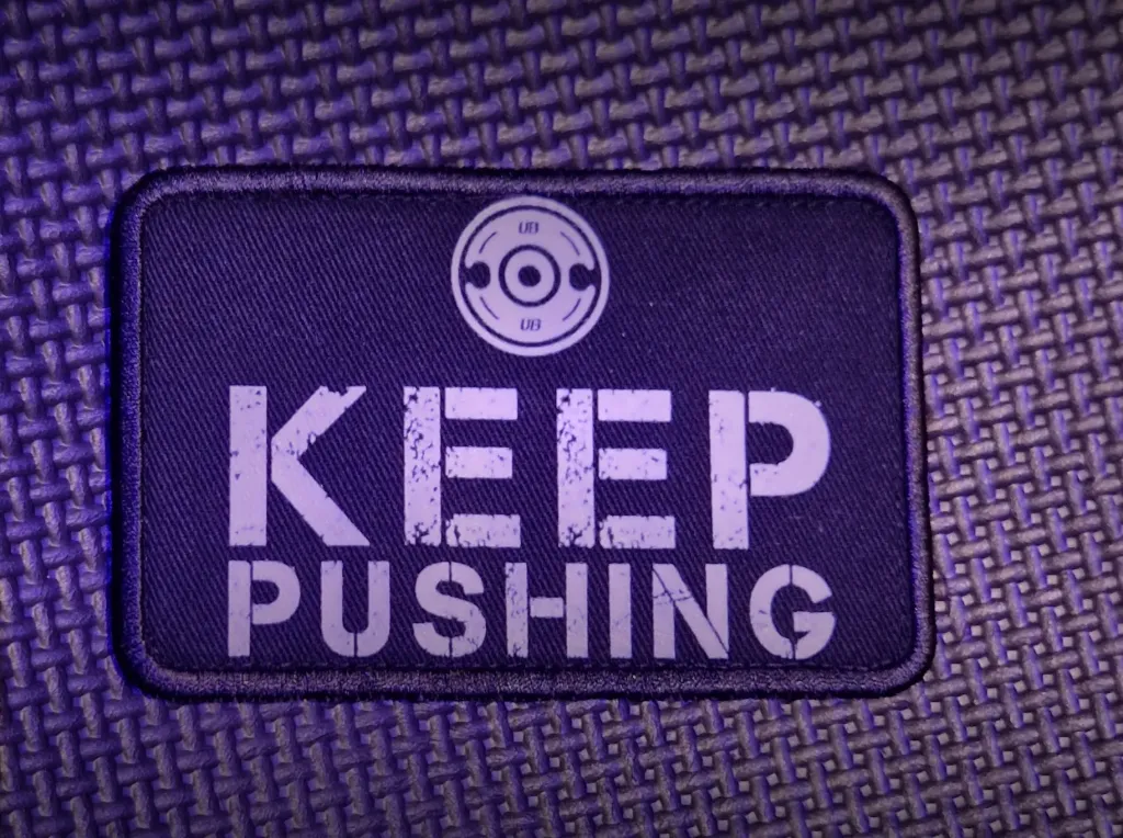 Keep Pushing Patch Patch, Größe: 10 x 6,5 cm, Klett (Schwarz)